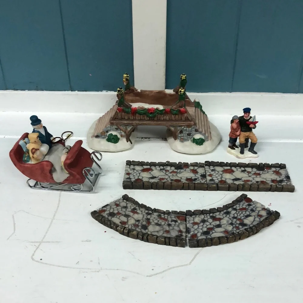 Lot of Christmas village cobblestone road bridge family in slay Lemax father son